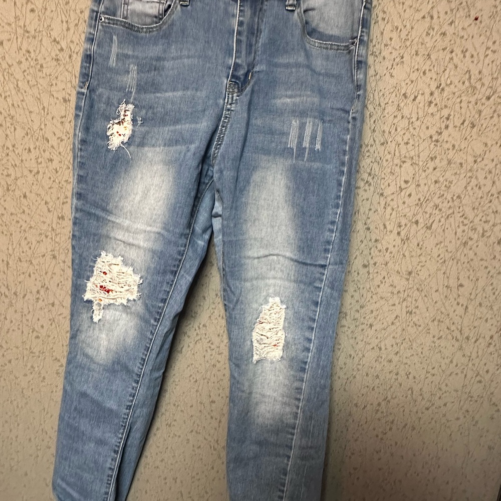 Distressed Light Blue Jeans